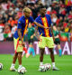 Spain's forward #19 Lamine Yamal (L) and Spain's forward #11 Nico Williams practice shooting during the warm up prior to the UEFA Nations League final football match between Portugal and Spain in Munich, southern Germany on June 8, 2025. (Photo by John MACDOUGALL / AFP)