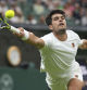 Spain's Carlos Alcaraz returns to Russia's Andrey Rublev during a fourth round men's singles match at the Wimbledon Tennis Championships in London, Sunday, July 6, 2025. (AP Photo/Alastair Grant)