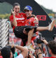 MOTEGI (Japan), 28/09/2025.- MotoGP Ducati Lenovo Team rider Marc Marquez (R) of Spain and his girlfriend Gemma Pinto (L) celebrate his World Champion 2025 title after the race at the Motorcycling Grand Prix of Japan in Motegi, Tochigi Prefecture, northeastern Japan, 28 September 2025. (Motociclismo, Japón, España) EFE/EPA/FRANCK ROBICHON