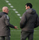 Soccer Football - Copa del Rey - Round of 16 - Real Madrid Training - Ciudad Real Madrid, Madrid, Spain - January 13, 2026 Real Madrid coach Alvaro Arbeloa with assistant coach Antonio Pintus during training REUTERS/Susana Vera