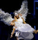 MILAN, ITALY - FEBRUARY 06: Cupid (Claudio Coviello) & Psyche (Antonella Albano) perform a tribute to Italian beauty during the opening ceremony of the Milano Cortina 2026 Winter Olympics at San Siro Stadium on February 06, 2026 in Milan, Italy. (Photo by Sarah Stier/Getty Images)