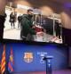 The image of Barcelona's Argentinian forward Lionel Messi voting for FC Barcelona presidential election is displayed at the Camp Nou stadium in Barcelona on March 07, 2021. (Photo by LLUIS GENE / AFP)