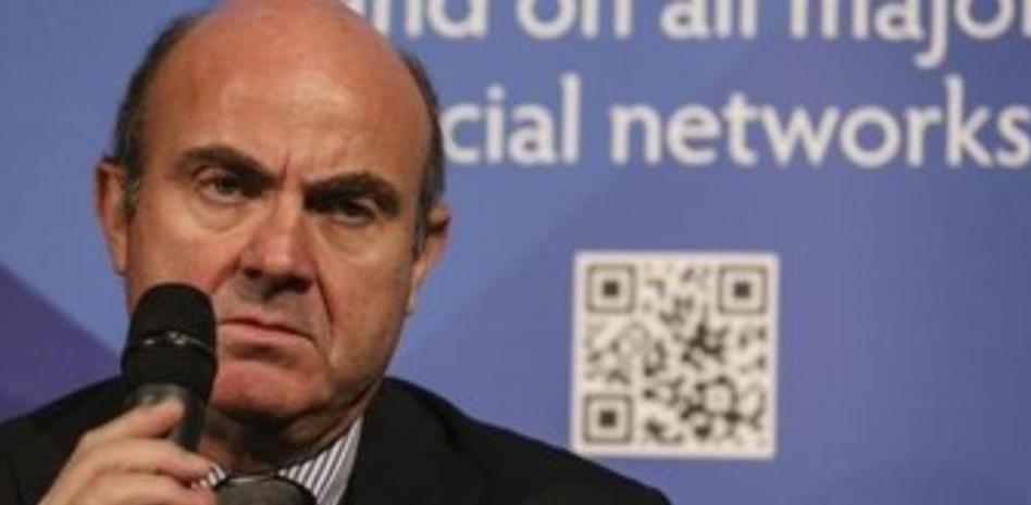 Guindos dice que la economía española crecerá cerca del 1% este año y creará empleo neto