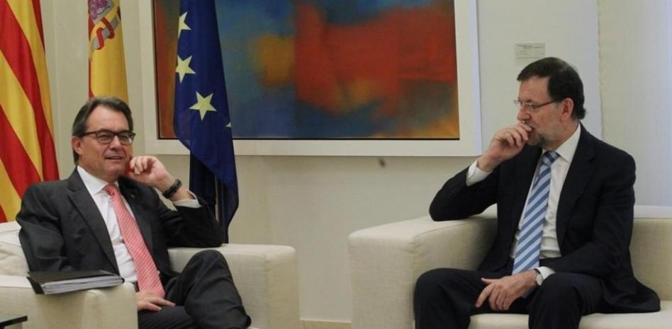 Gritos de "visca España" interrumpen a Mas en Madrid