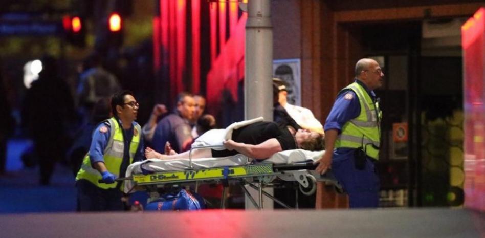 Cinco rehenes escapan del café de Sydney tomado por un presunto islamista