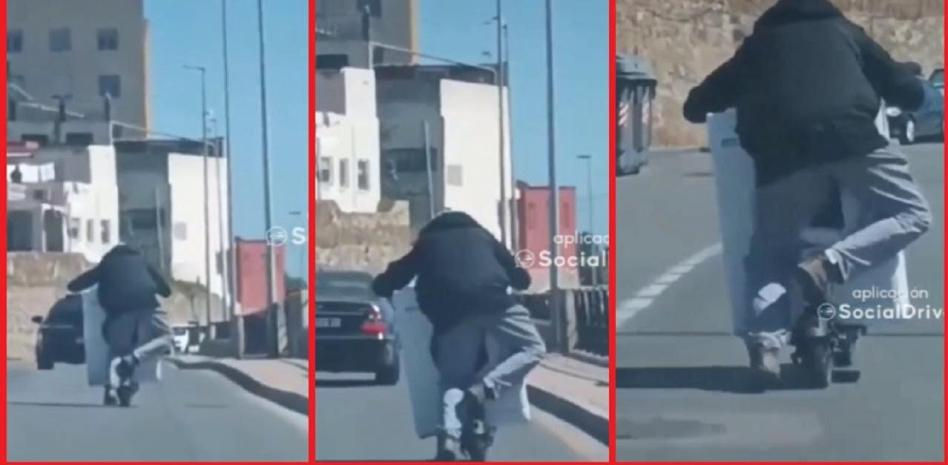 Cazan a un joven circulando en patinete eléctrico con una lavadora: "Cómo tumba para coger la curva"