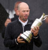 Brian Harman se da un paseo bajo la lluvia para ganar el British Open