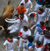 Cinco heridos por contusiones en un quinto encierro masificado de San Fermín