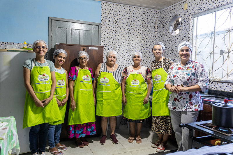 Mulheres reunidas no projeto — imagem do impacto social