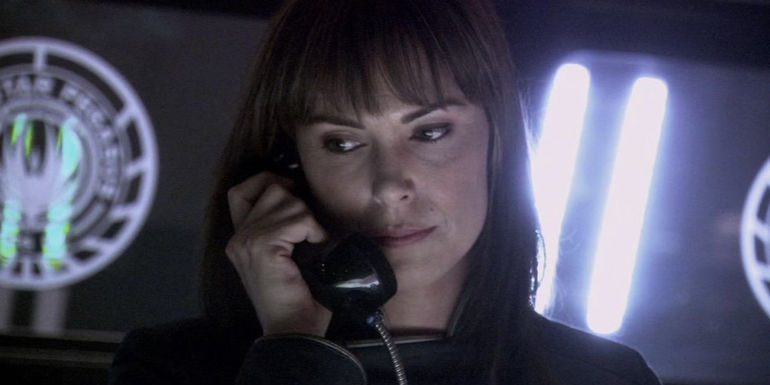 Helena Cain (Michelle Forbes) on the phone in Battlestar Galactica