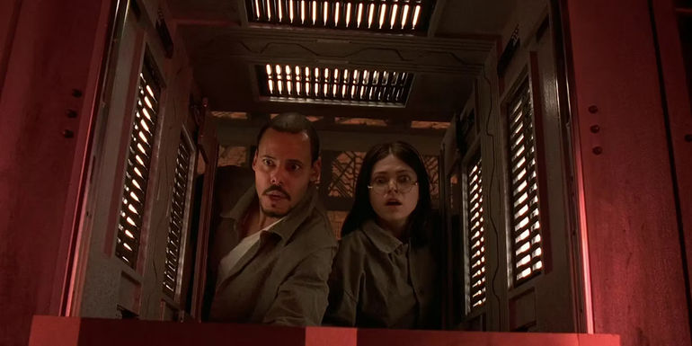 Leaven and Quintin look into the next cube in the movie Cube.