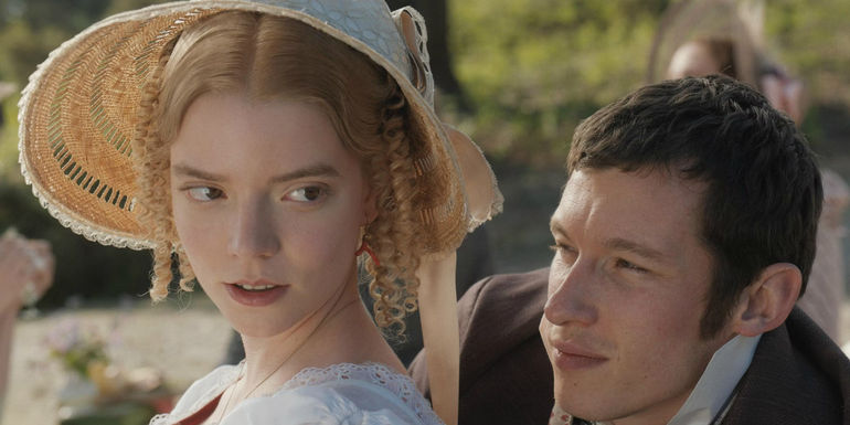 George (Johnny Flynn) moving behind Emma (Anya Taylor-Joy) in Emma