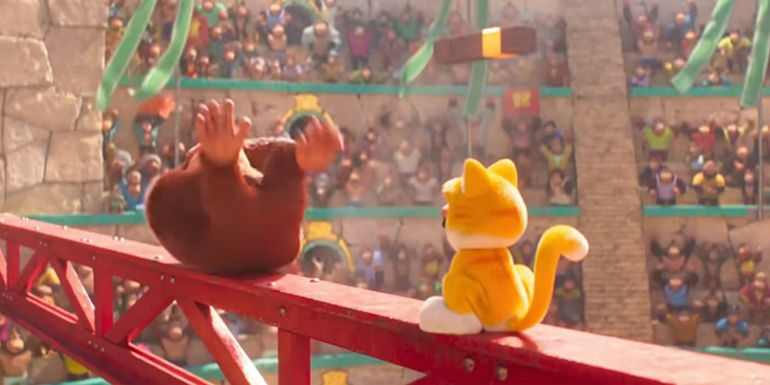 Donkey Kong rolling with laughter after Mario gets the Cat box in The Super Mario Bros. Movie.