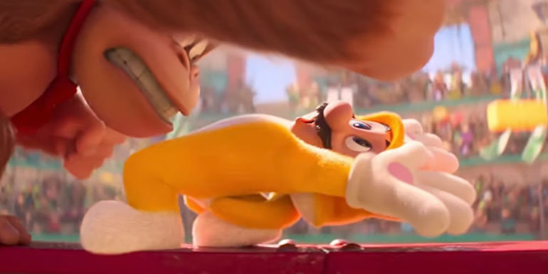 Mario wearing a cat suit and dodging Donkey Kong in The Super Mario Bros. Movie.