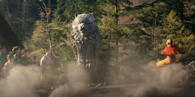 Gordon Cormier as Aang Air Bending in front of children in Netflix's Avatar: The Last Airbender