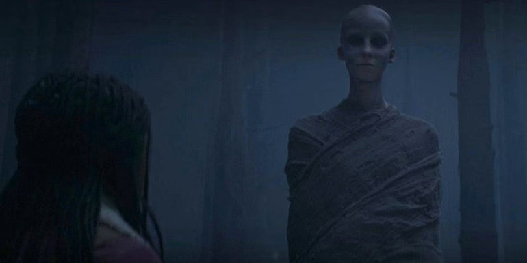 Annabeth looking at a soul in the Asphodel Fields in Percy Jackson episode 7