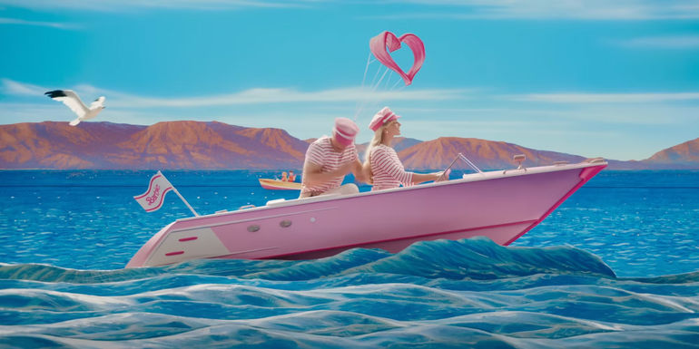 Barbie and Ken riding on a boat in Barbie (2023)