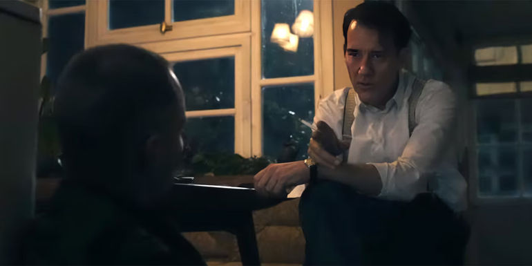 Clive Owen as Sam Spade interrogating someone in Monsieur Spade