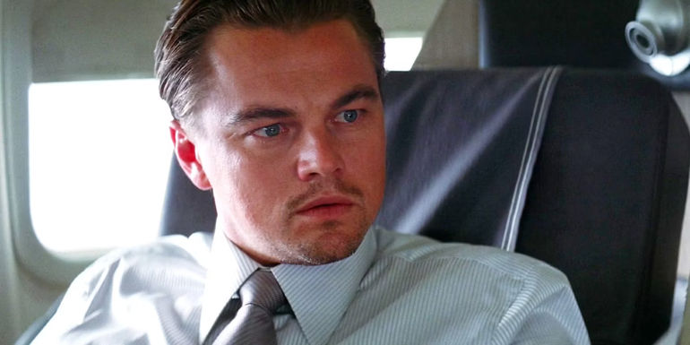 Leonardo Dicaprio as Cobb on a plane in Inception