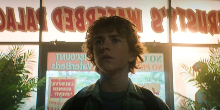 Percy entering a waterbed store in Percy Jackson episode 7