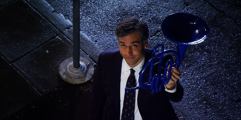 Ted Holds Up The Blue French Horn to Robin as the Two Reunite in the How I Met Your Mother Finale