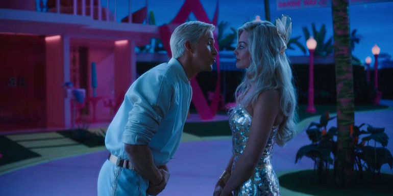 Ken (Ryan Gosling) awkwardly leaning in to kiss Barbie (Margot Robbie) after a night out in Barbie.
