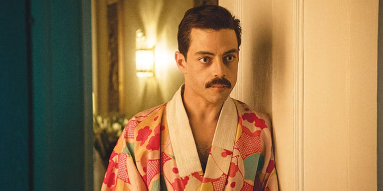 Rami Malek as Freddie Mercury in a Bath Robe Looking Serious in Bohemian Rhapsody