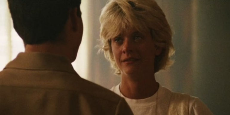 Carole crying looking at Maverick in Top Gun 