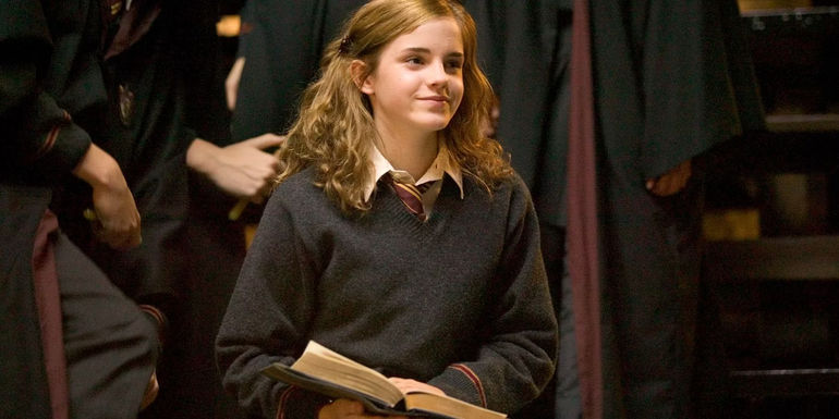 Emma Watson As Hermione Granger Reading A Book in Harry Potter