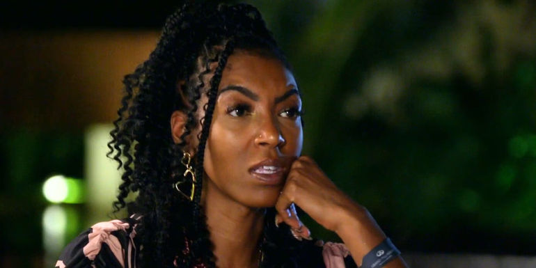 Lauren from Married at First Sight Season 17 sitting accross from Orion withupset look on her face 2