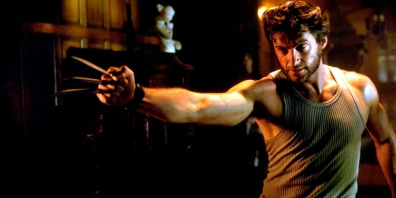 Wolverine holding his claws out in X2