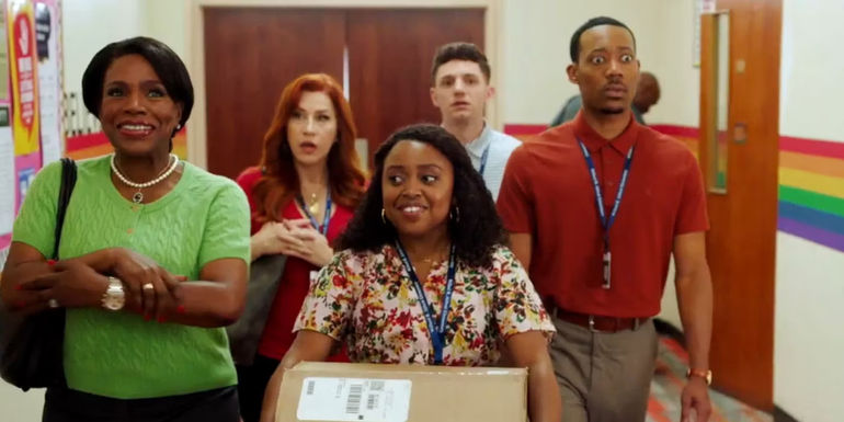 Abbott Elementary cast walking down the hallway