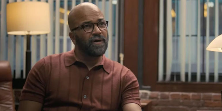 Jeffrey Wright as Thelonious Monk Ellison speaks to an off-screen John Ortiz as Arthur in American Fiction.