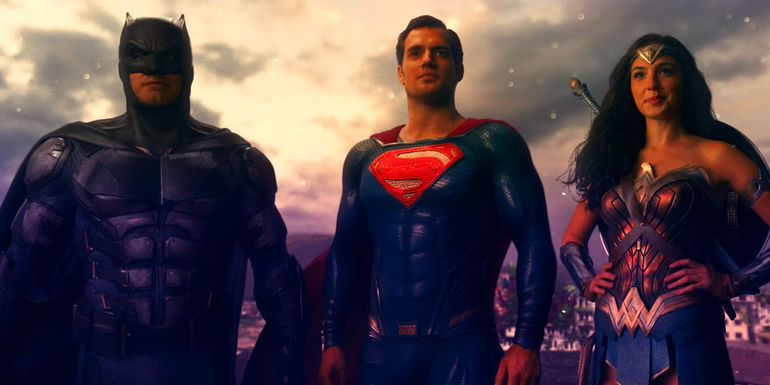 Superman Batman Wonder Woman standing in a row and looking heroic in Justice League