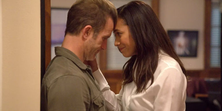 Jason (Scott Caan) and Nikki (Dania Ramirez) embrace each other in Alert Missing Persons Unit