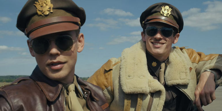 Austin Butler and another officer in Masters of the Air wearing uniforms and sunglasses
