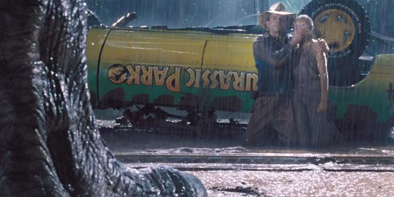 Sam Neill's Alan and Ariana Richards' Lex staring at the T. Rex's foot beside a flipped jeep in Jurassic Park