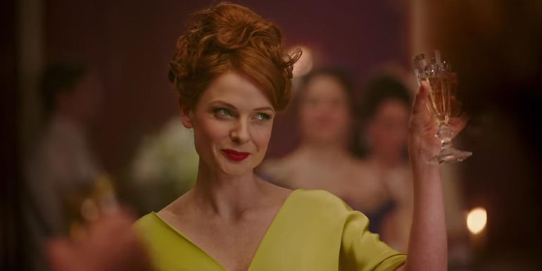 Rebecca Ferguson raises a glass in The Greatest Showman