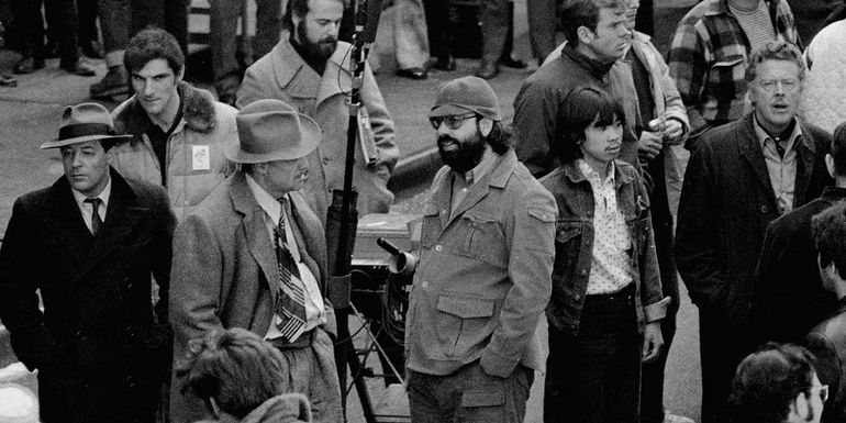 Francis Ford Coppola gives instructions to Marlon Brando on the set of The Godfather