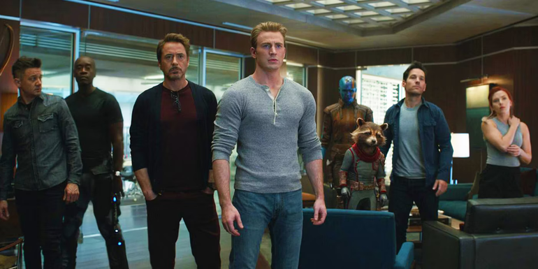 Several Avengers stand around in casual clothing in Avengers: Endgame