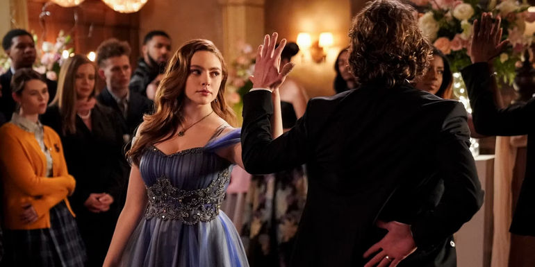 Hope (Danielle Rose Russell) dancing with Roman (Jedidiah Goodacre) at the Miss Mystic Falls Pageant in Legacies