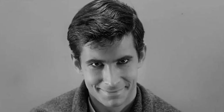 Anthony Perkins as Norman Bates smiling in Psycho pic