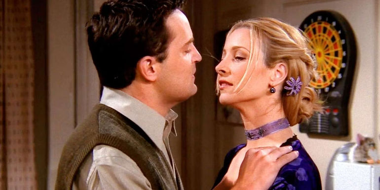 Chandler and Phoebe about to kiss in Friends The One Where Everybody Finds Out