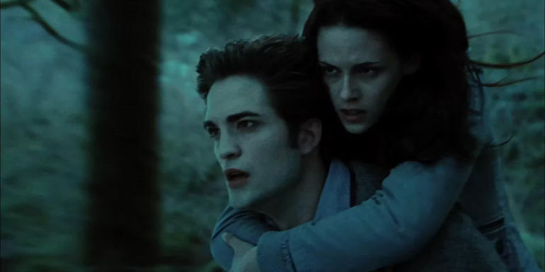 Edward carrying Bella in the Twilight movie