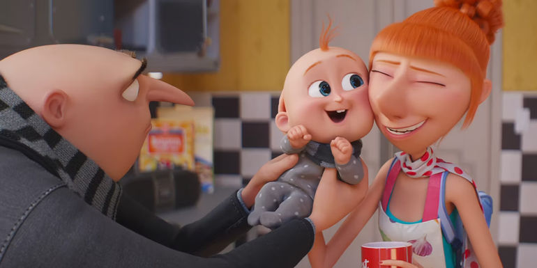 Gru holding the baby with his wife from the Despicable Me 4 movie trailer