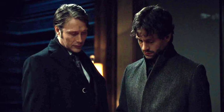 Hugh Dancy and Mads Mikkelsen looking down in Hannibal