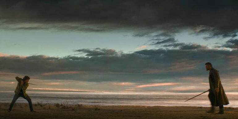 Percy leveling his sword as Ares walks towards him in Percy Jackson episode 8