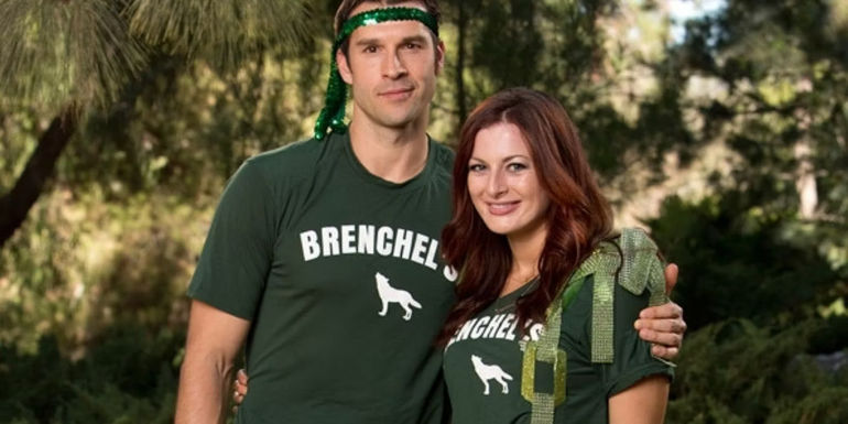 Brendon and Rachel posing for a photo in a forest in The Amazing Race
