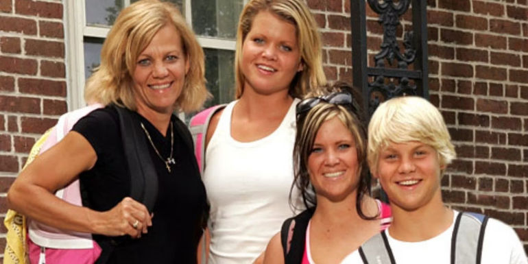 The Weaver Family smiling and posing for a photo in The Amazing Race