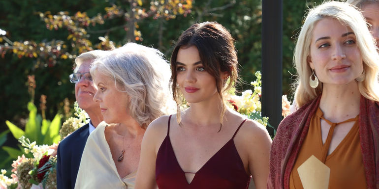 Lucy Hale stares across the dance floor at her friend's wedding in Which Brings Me to You